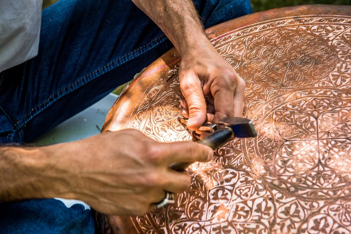 Artisan crafting pottery